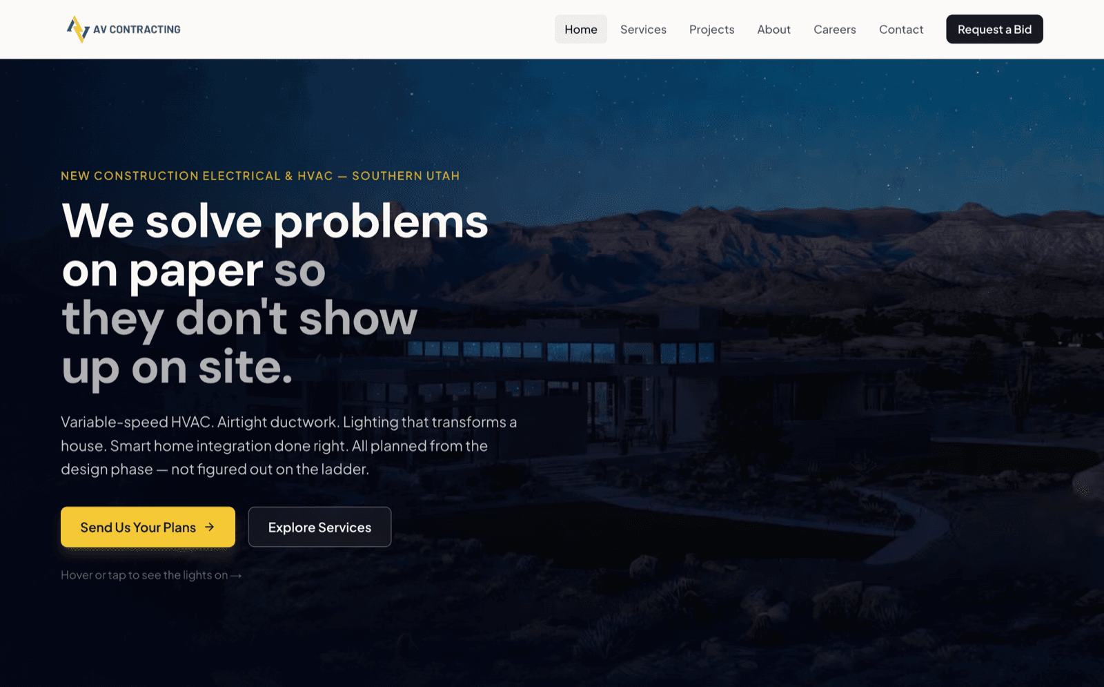 AV Contracting home page with the interactive lights-on hero